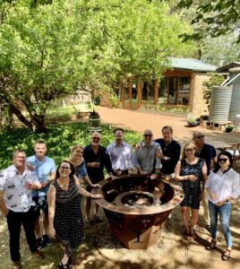 Guests on our Southern Highlands Winery Tour enjoying an outdoor wine tasting experience at Joadja Estate's wine garden.